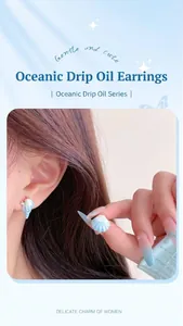 Detailed close-up of ocean-style light blue shell earrings with silver needles on model