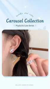Close-up of carousel stud earrings with blue enamel finish and sparkling rhinestone details