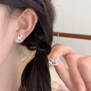 Cute sky blue carousel horse drop earrings with pink crystal and sparkling zircons