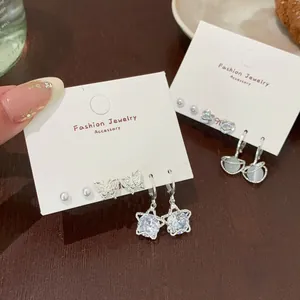 Minimalist silver star and heart earring set with sparkling zircon and opal stones