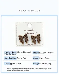 Detail view of leopard print flocked heart earrings with dimensions and weight data