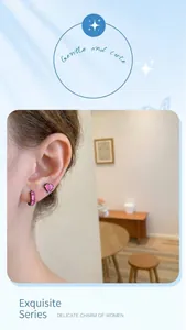 Close-up of pink heart stud and black textured earring on model in Barbie style