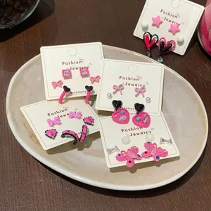 Pink and black butterfly heart earring set with fashion jewelry card packaging
