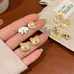 Cute cartoon animal stud earring set featuring cats and bears with enamel finish