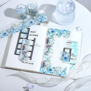 Winter floral Snow Garden PET tape roll and decorative planner stickers on white desk