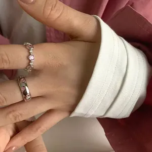 Silver-plated ring set featuring pink heart-shaped zircons in a sweet minimalist design