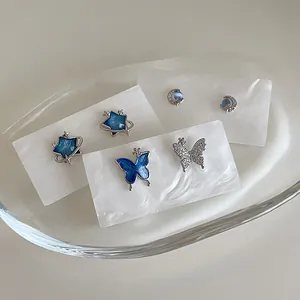 S925 silver stud earrings set featuring blue zircon star, butterfly and moon designs