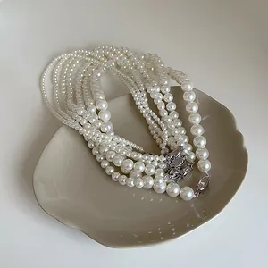 Collier de perles de verre vintage français avec fermoirs argentés de tailles variées