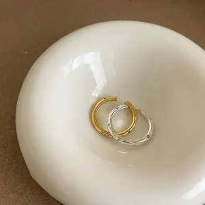 Minimalist hammered texture open rings in gold and silver finish with zircon accents