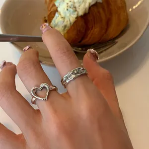 Irregular silver heart rings set with you are my story engraving in a vintage style