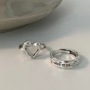 Detail view of S925 silver ring set with heart shape and 'You are my story' engraving