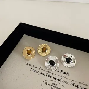 Retro hammered metal stud earrings with natural tiger eye and black gemstones