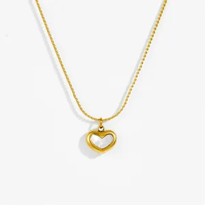 Minimalist gold titanium necklace featuring a heart-shaped mother of pearl pendant for women