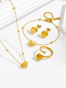 Macro view of 18K gold plated stainless steel heart jewelry set with beaded chain