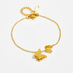 Goudkleurige titanium stalen ketting met matte en gepolijste vlinderhangers