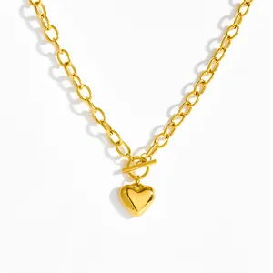 Gold heart pendant necklace with toggle clasp on minimalist chain for women