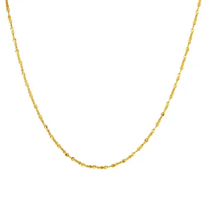 Macro shot of 2.4mm gold titanium steel bead chain with sparkling textured finish