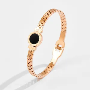 Rose gold stainless steel bracelet with Roman numeral disc and watch band style chain