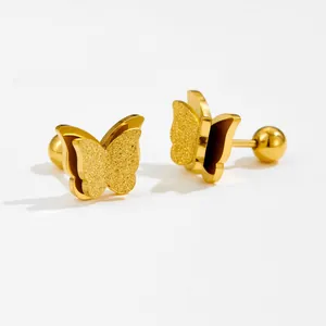 Detail of gold butterfly studs with matte finish and secure screw back closure