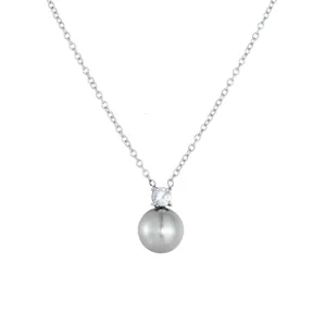 Minimalist silver necklace featuring a dark grey pearl pendant and a sparkling zircon stone