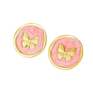 Vintage gold butterfly stud earrings with pink marble enamel inlay in French retro style