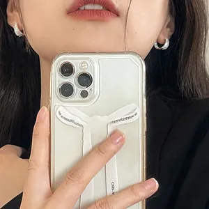 Close-up of sparkling silver hoop earrings with inlaid rhinestones on a female model