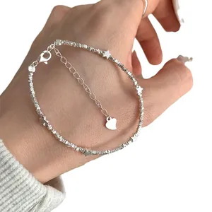 Minimalist silver star bracelet for women with heart pendant and adjustable lobster clasp
