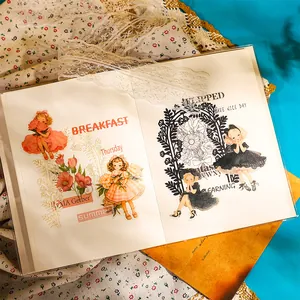 Vintage girl and flower stickers for scrapbooking with warm retro aesthetic on a notebook