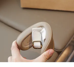 Detail showing high flexibility of the soft rubber sole on these girls' summer sandals