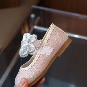 Pink glitter girls Mary Jane princess shoes with 3D butterfly detail and scalloped trim