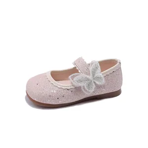 Sparkly pink glitter Mary Jane shoes for girls with a decorative silver butterfly detail