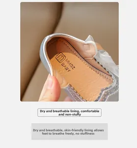 Detailed view of breathable lining and mesh lace collar on silver girls princess shoes