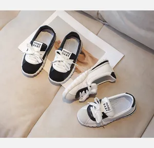 Detail view of NINGZ BABY kids sneakers with non-slip thick soles and mesh lining