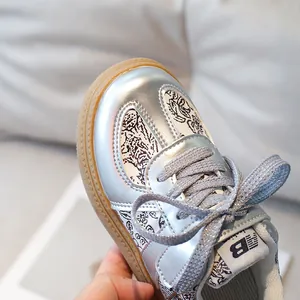 Kids metallic silver sneakers with graffiti patterns and anti-slip rubber soles