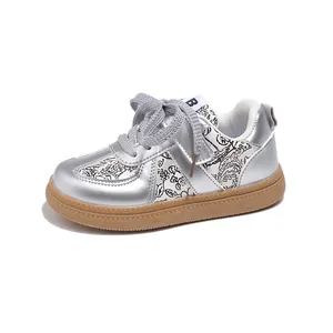 Silver kids athletic sneakers with floral pattern and nonslip rubber sole for casual wear