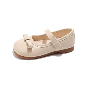 Beige Mary Jane shoes for girls with bow decoration and adjustable velcro strap