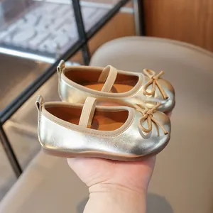 Champagne gold Mary Jane flats for girls with bow detail and soft non-slip rubber sole