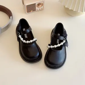 Classic black Mary Jane shoes for girls with pearl chain and bow decoration for parties