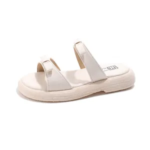 Kids off-white double strap slide sandals with cute bow accents and thick anti-slip sole