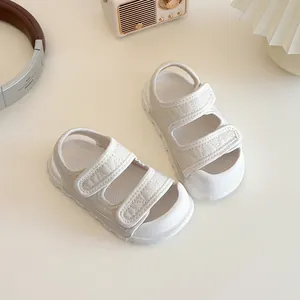 Girls white sandals with adjustable velcro straps and thick anti-slip soles for summer