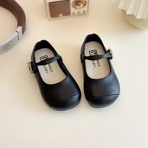 Classic black Mary Jane shoes for girls with elegant pearl and gold flower buckles