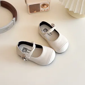 Classic cream Mary Jane shoes for girls with pearl flower accents and soft soles