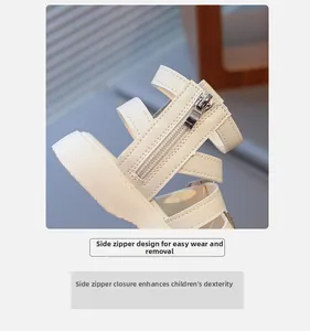 Detail of child's cream sandal featuring a side zipper for easy wear and off