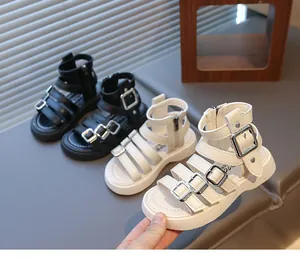 Detail view of stylish kids gladiator sandals with metallic buckles and convenient back zipper