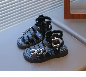 Detail view of black Roman sandals for girls with silver metal buckles and zipper closure