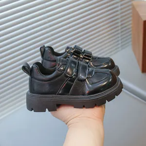 Black children's leather shoes with double velcro straps and thick anti-slip rubber sole