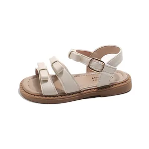 Sandali da bambina color crema con fiocchi decorativi e cinturino regolabile dorato
