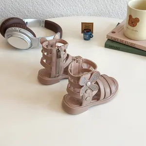 Pink rhinestone roman sandals for girls featuring butterfly bow and back zipper design