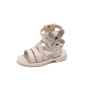 Beige Roman style girls' sandals with glitter butterfly accents and back zipper