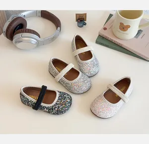 Close-up of sparkling sequin Mary Jane shoes for girls with elasticated straps in four colors